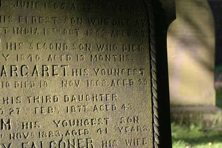 A portion of an old tombstone in Glasgow, Scotland.の写真素材