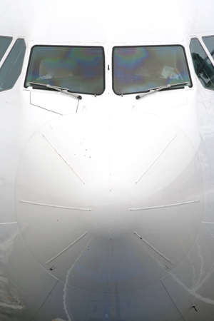 A jet waits on the runway to load its passengers.の写真素材