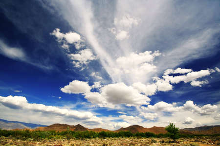 A dramatic blue sky in the California desert.の写真素材