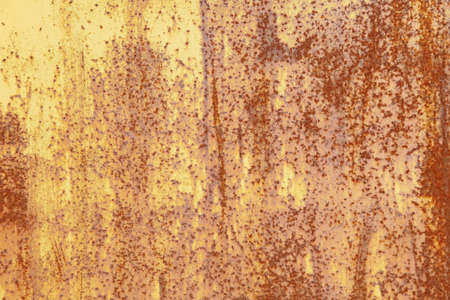 A rustly piece of yellow steel.の写真素材