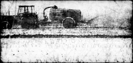 Spraying manure, on old photo taken in switserland in 1967, transformed inti a B/W graphicの写真素材