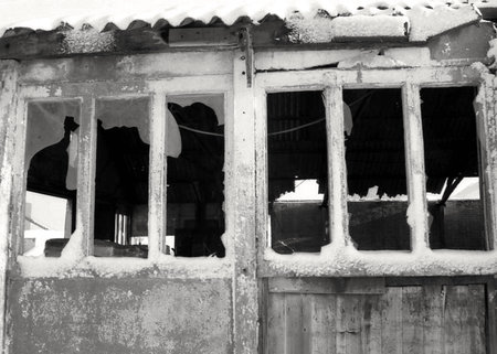 Broken windows in shelfの写真素材