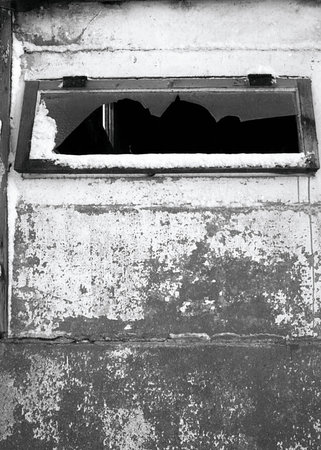 Broken window in shelfの写真素材