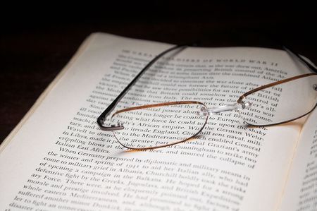 Old Book and Reading Glasses