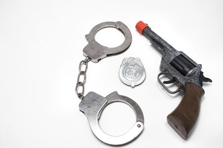 Badge, Handcuffs and Gunの写真素材