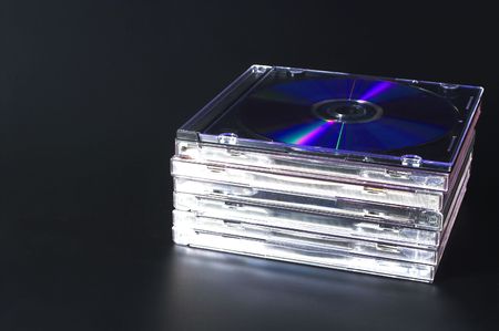 A stack of compact discs with recorded music.の写真素材