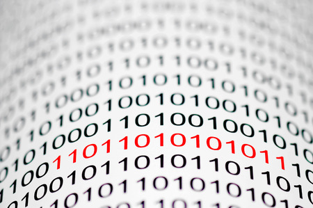 1's and 0's making up a computer program.の写真素材