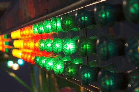 The bright and colorful lights on a carvival ride.の写真素材