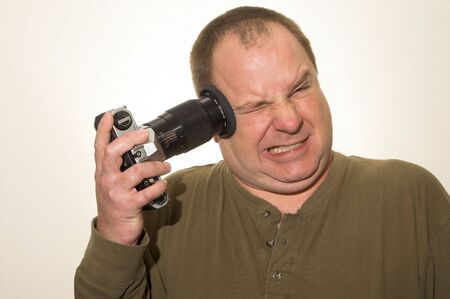 A photographer shooting his own head off.の写真素材