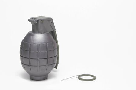 A hand grenade with the pin missing.