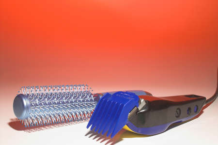 A hairbrush and a set of shears.の写真素材