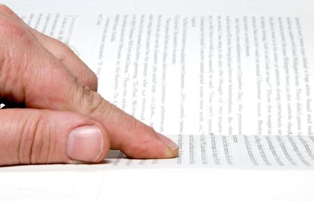 A person studying or reading a book.