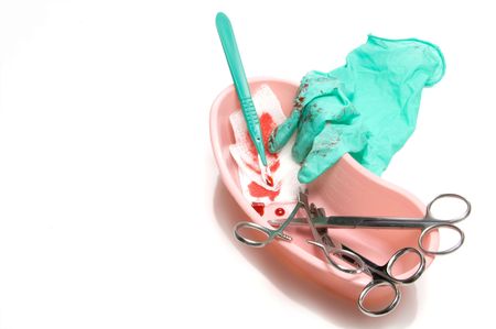 A used minor surgery kit after a procedure.