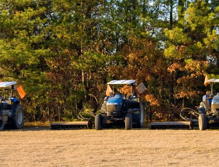 Professional bush hog lawn mowers ready for action.の写真素材