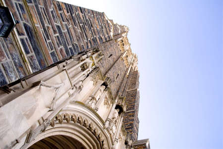 The exterior of a large medieval cathedral.の写真素材