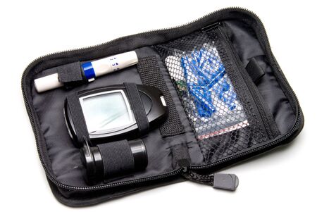 A dibetics medical insulin kit with glucometer.