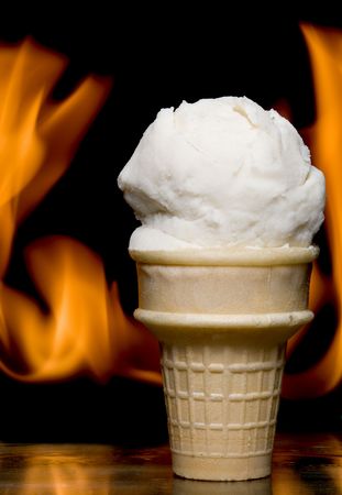 Flaming Ice Cream in a wafer cone on fire.の写真素材