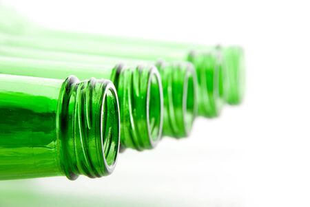 Beer bottles turned over on their sides.の写真素材