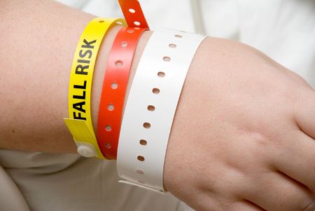 A Fall Risk Bracelet on the arm of a patientの写真素材
