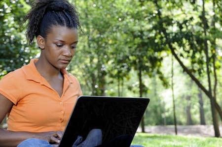 A college student working on a laptopの写真素材