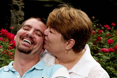 A husband and his wife standing togetherの写真素材