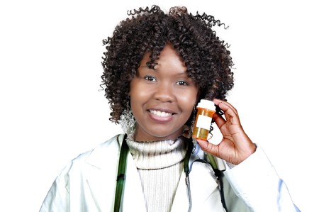 An doctor holding a bottle of prescription medication の写真素材