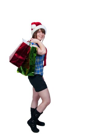 A beautiful young woman on a Christmas shopping spreeの写真素材
