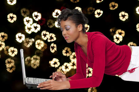 A college student working on a laptop