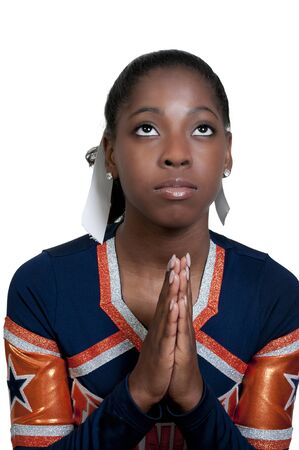A young teenage black african American cheerleader