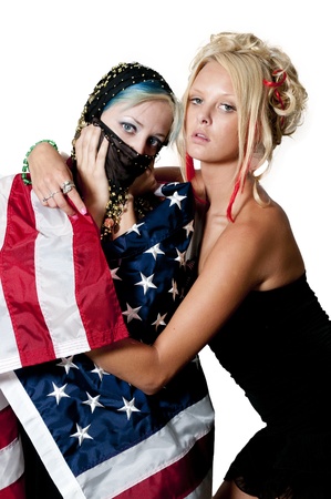An Arab woman wrapped in an American flagの写真素材
