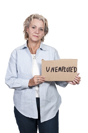 A beautiful young woman holding up an unemployment signの写真素材