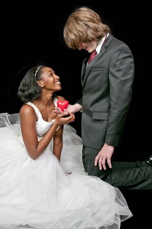 Caucasian man and a black African American woman newly married newlyweds