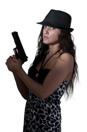 A beautiful police detective woman on the job with a gunの写真素材