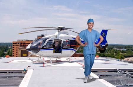 Woman doctor and a mobile flying ambulance better known as a life flightの写真素材