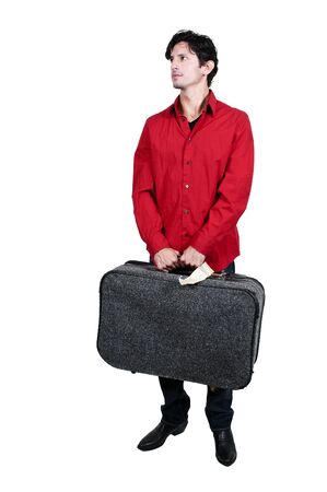An attractive young man going on vacationの写真素材