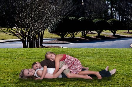 Single mom and her son and daughterの写真素材