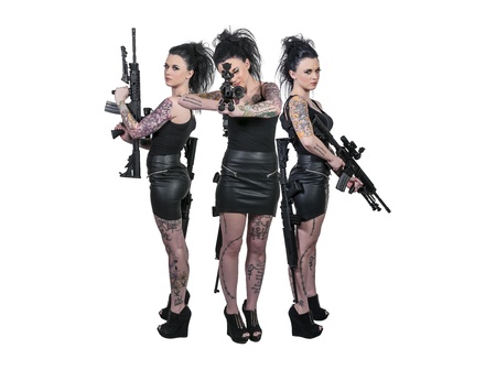 Beautiful young women holding an automatic assault riflesの写真素材