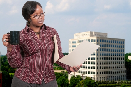Beautiful young woman drinking coffee in the morningの写真素材