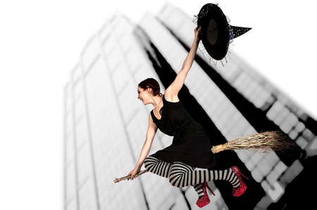 Beautiful woman wicked witch with ruby shoesの写真素材