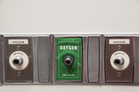 An oxygen outlet on the wall of a patient room in a hospitalの写真素材