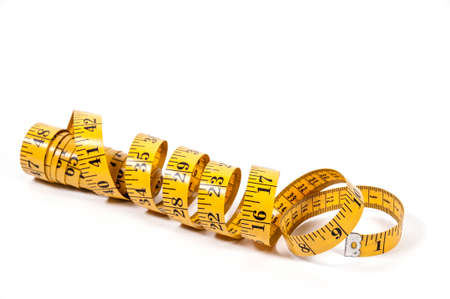 Tailors measuring tape coiled up randomly
