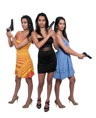Beautiful police detective women on the job with guns
