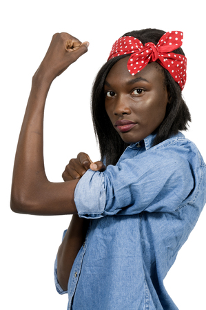 Beautiful woman dressed as the iconic Rosie the Riveterの写真素材