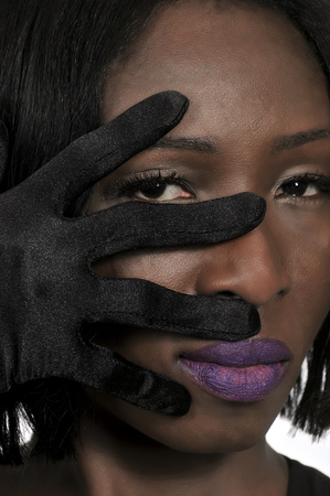 Beautiful young attractive high society woman wearing formal opera glovesの写真素材