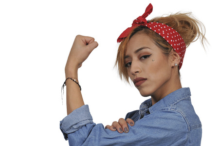 Beautiful woman dressed as the iconic Rosie the Riveterの写真素材