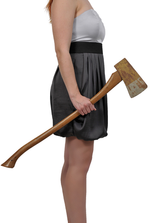Beautiful young woman holding an wooden handled axeの写真素材