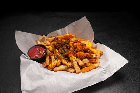 Contemporary American cuisine known as chili cheese fries