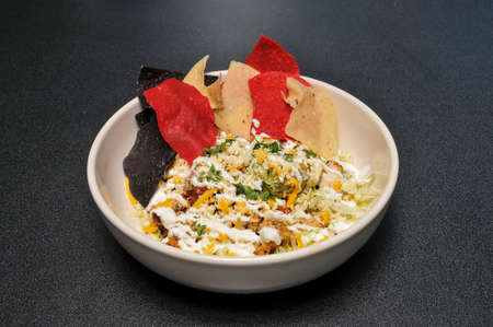 Traditional and authentic tex mex cuisine known as a chicken burrito bowlの写真素材