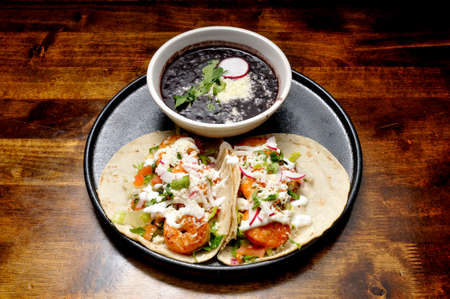 Authentic tex mex mexican cuisine known as a shrimp tacoの写真素材