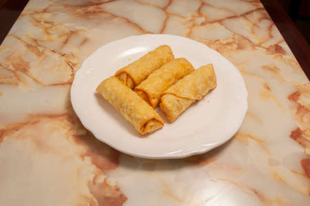 Delicious Chinese dish known as egg rollsの写真素材